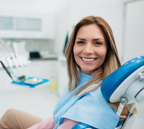 smiling woman at dentist