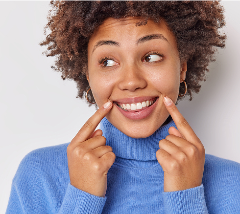 woman pointing at smile