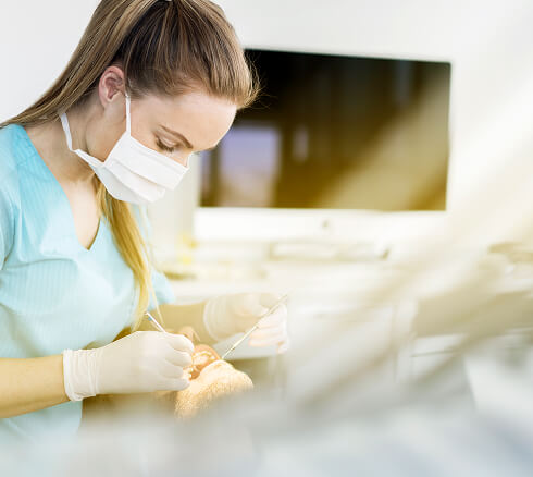 dentist working on patient