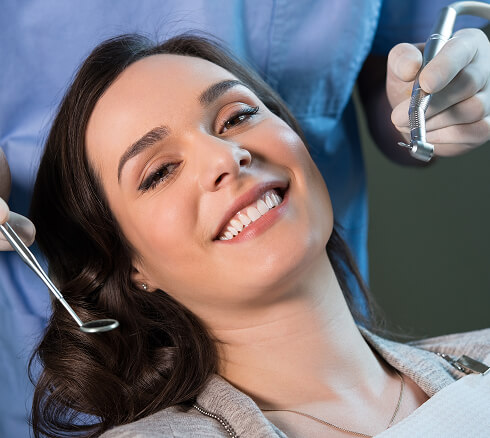 smiling woman at the dentist