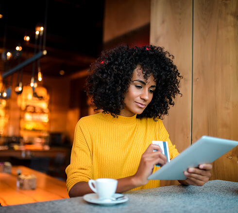 woman paying bill on computer